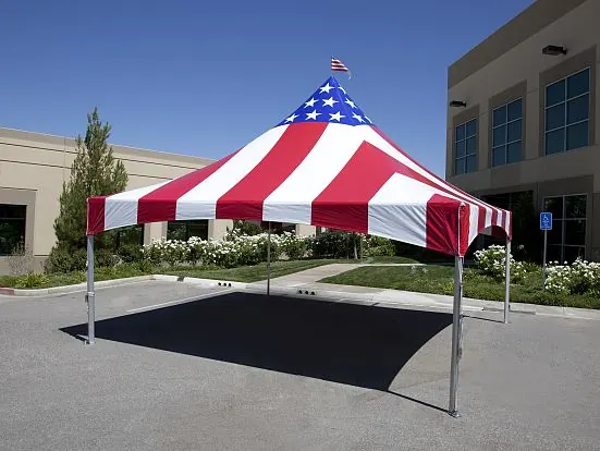 American flag frame tent on top of a parking space
